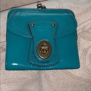 Turquoise coach wallet with legacy lining